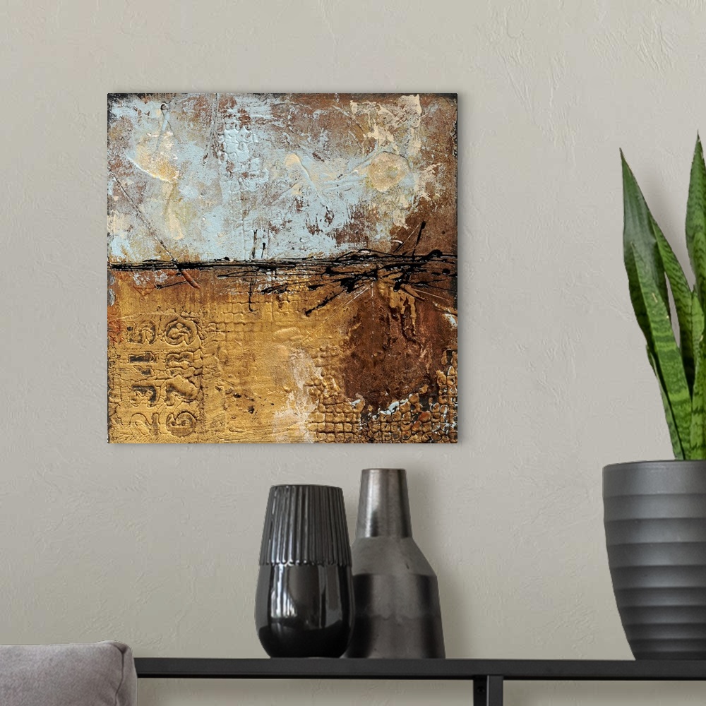 A modern room featuring This heavily textured abstract artwork makes use of layered designs and accents of paint drips.