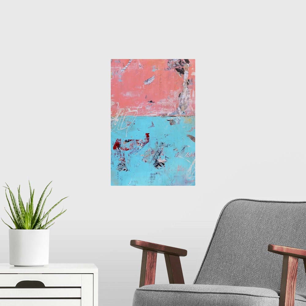 A modern room featuring A contemporary abstract made with a mixture of blue and salmon pink hues as well as newspaper cut...
