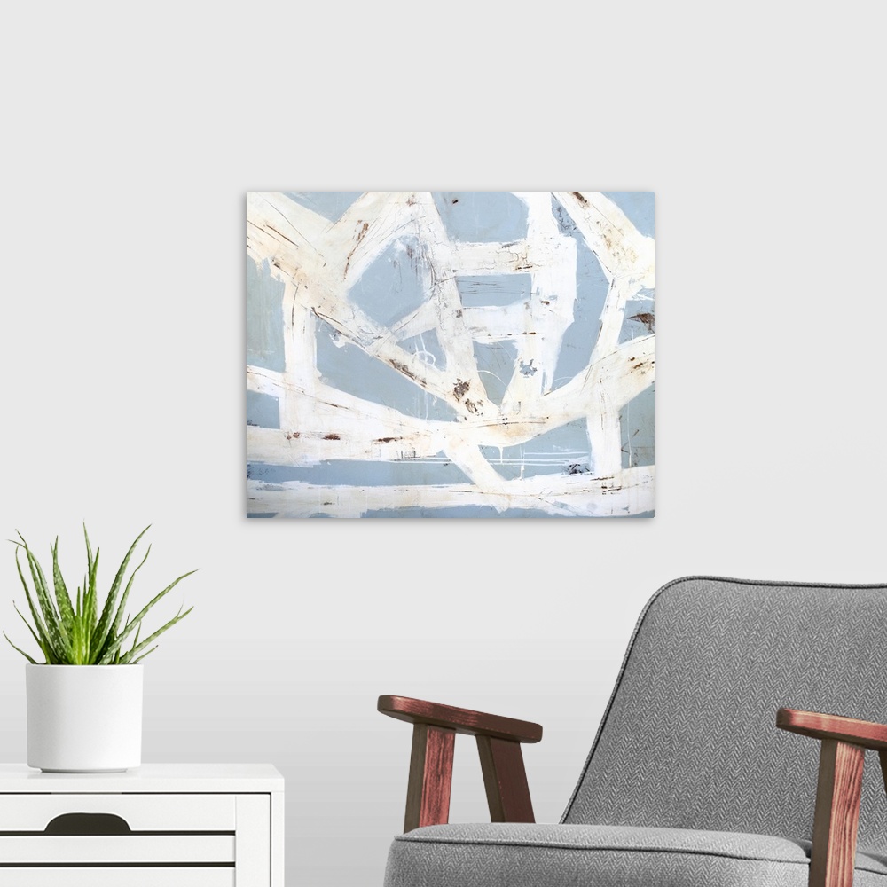 A modern room featuring Contemporary abstract art print of swirling strokes of white over pale blue.