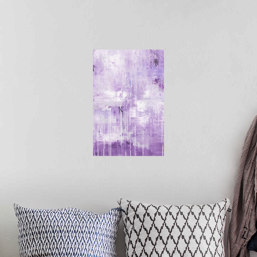 A bohemian room featuring A contemporary abstract painting made up of mostly lavender mixed with darker shades of purple an...