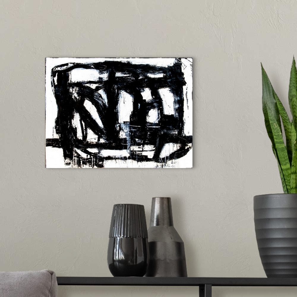 A modern room featuring A black and white abstract painting of bold, black brush strokes going in different directions an...