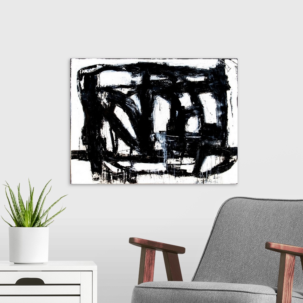 A modern room featuring A black and white abstract painting of bold, black brush strokes going in different directions an...