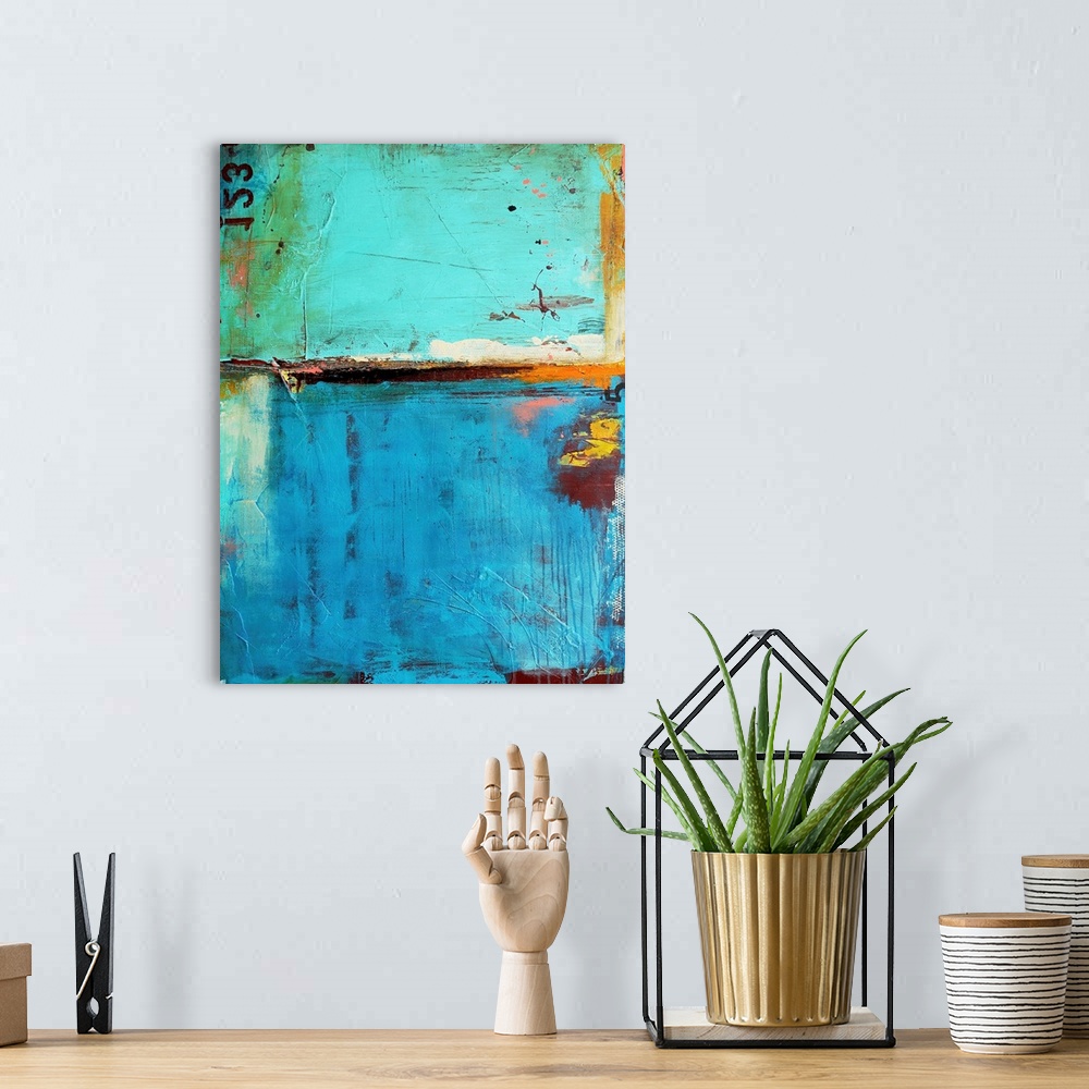 A bohemian room featuring A contemporary abstract painting of grungy paint textures and numbers.