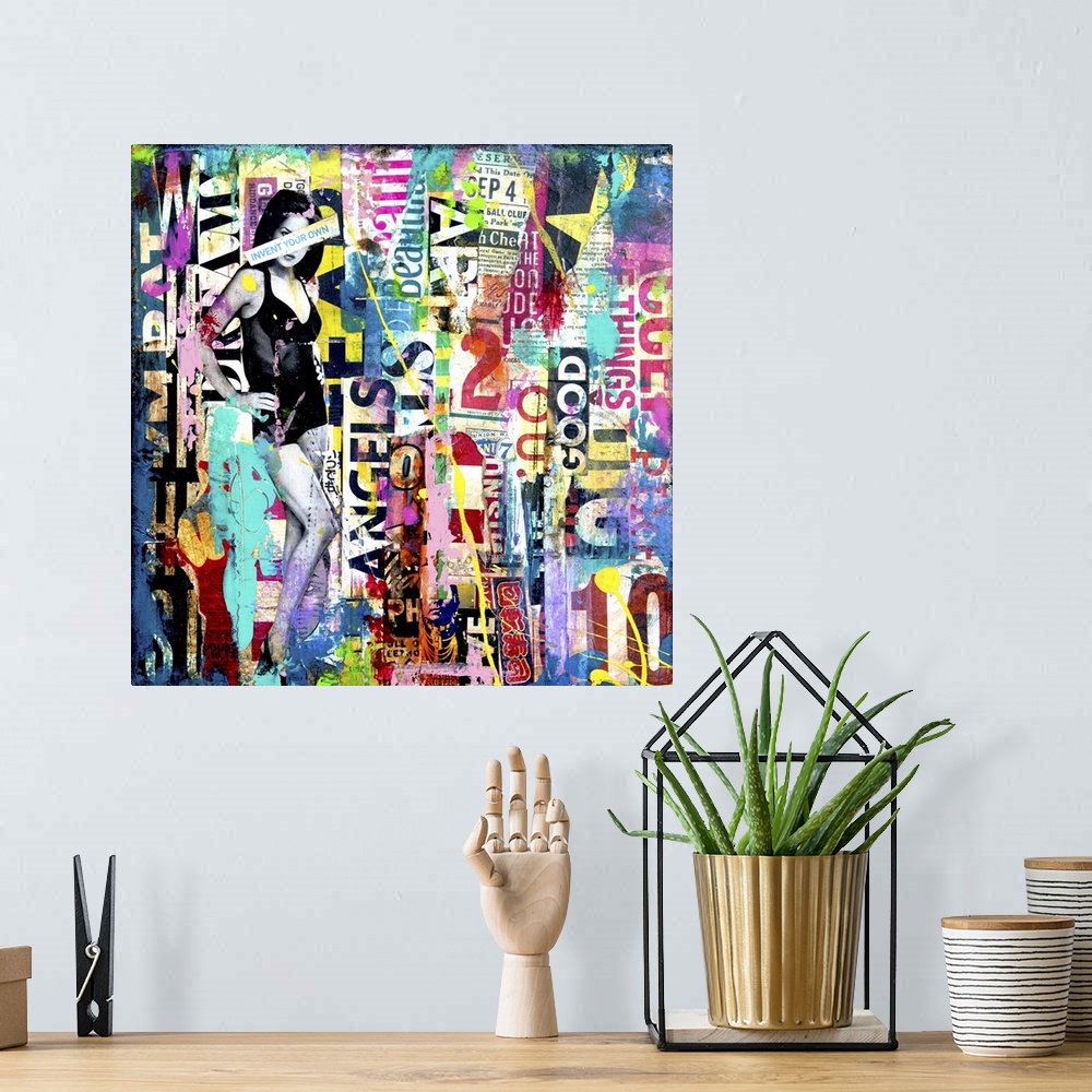 A bohemian room featuring Mixed media artwork with a black and white image of a woman on a colorful square background fille...