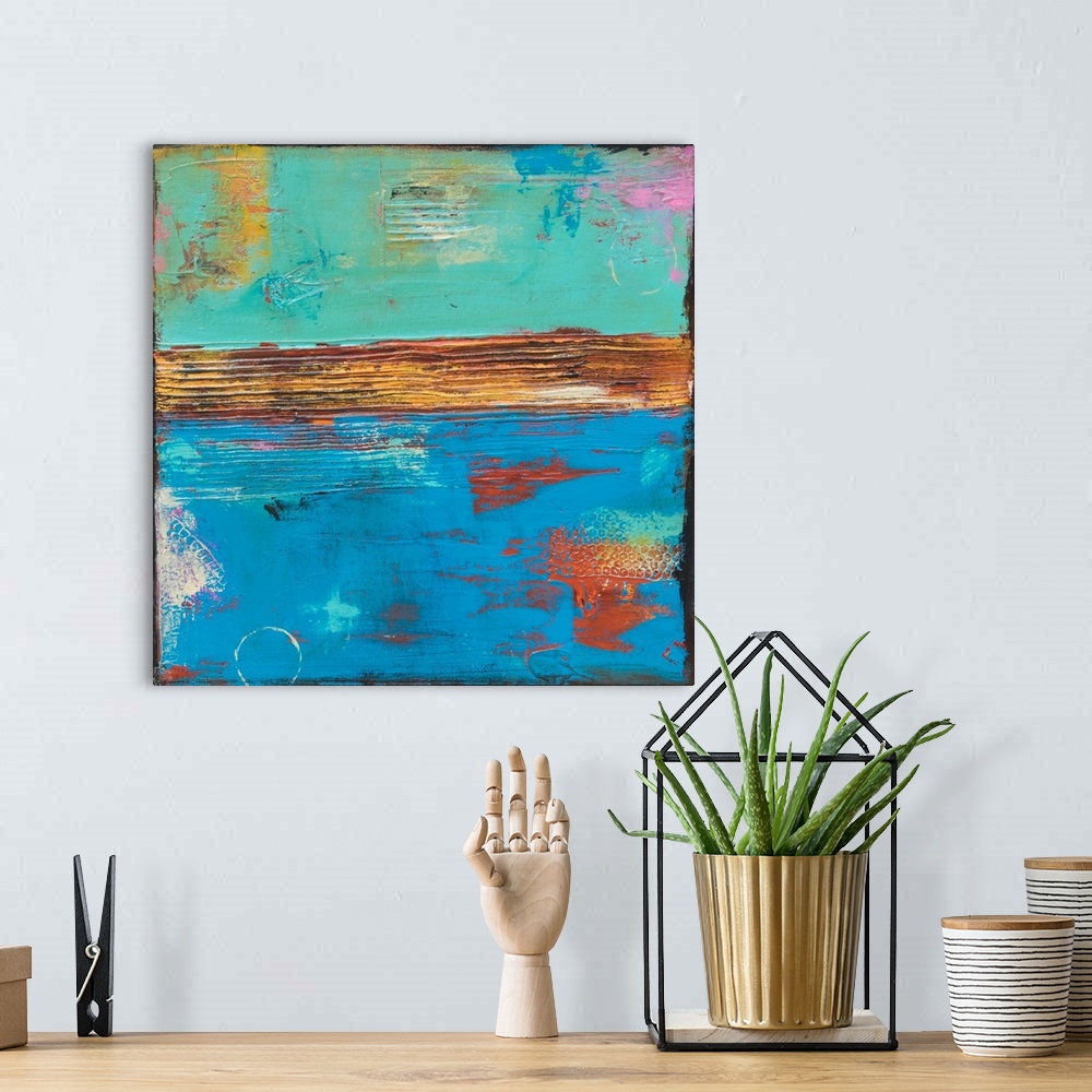 A bohemian room featuring Square abstract painting created with two halves in light shades of blue with colorful blotches o...