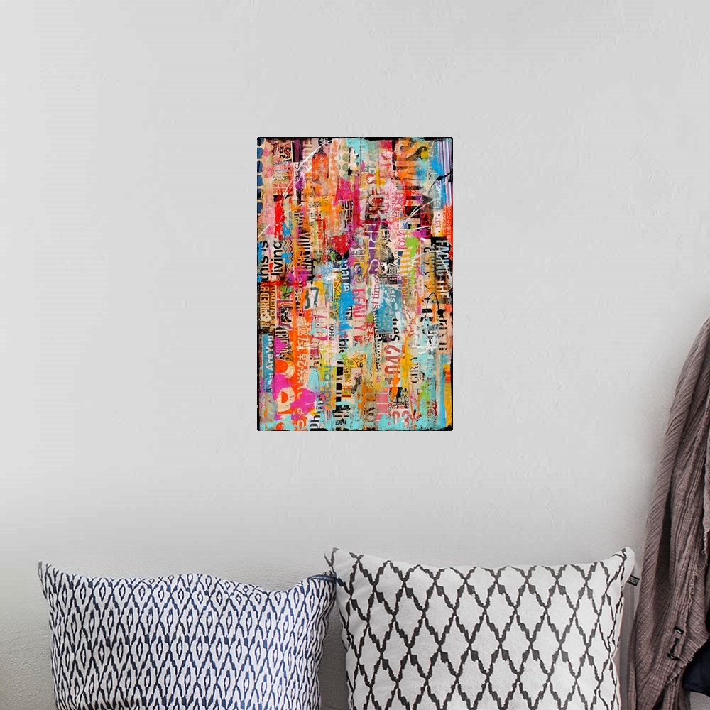 A bohemian room featuring Contemporary abstract painting using a collage of different print clippings and paint textures.