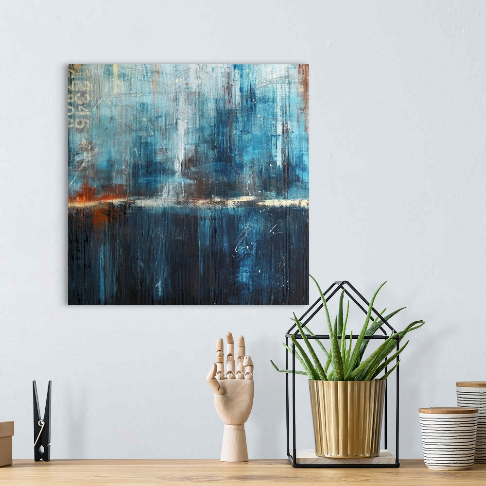 A bohemian room featuring Abstract canvas art of cool tones with heavy brush textures.