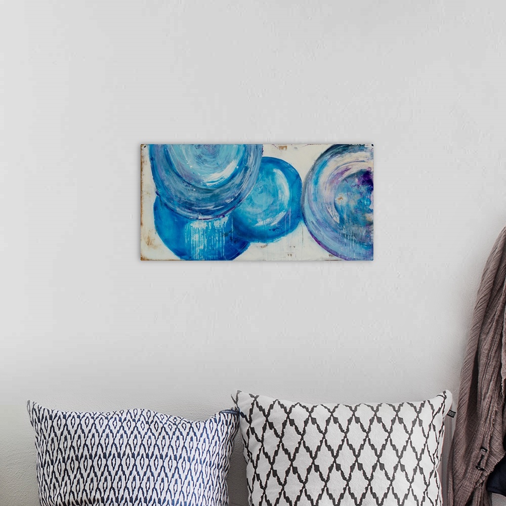 A bohemian room featuring Horizontal contemporary abstract painting with thick textured and layered brushstrokes in large c...