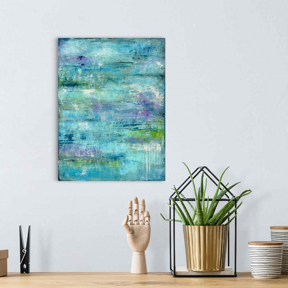 A bohemian room featuring Contemporary abstract painting using aqua tones mixed with touches of light purple.