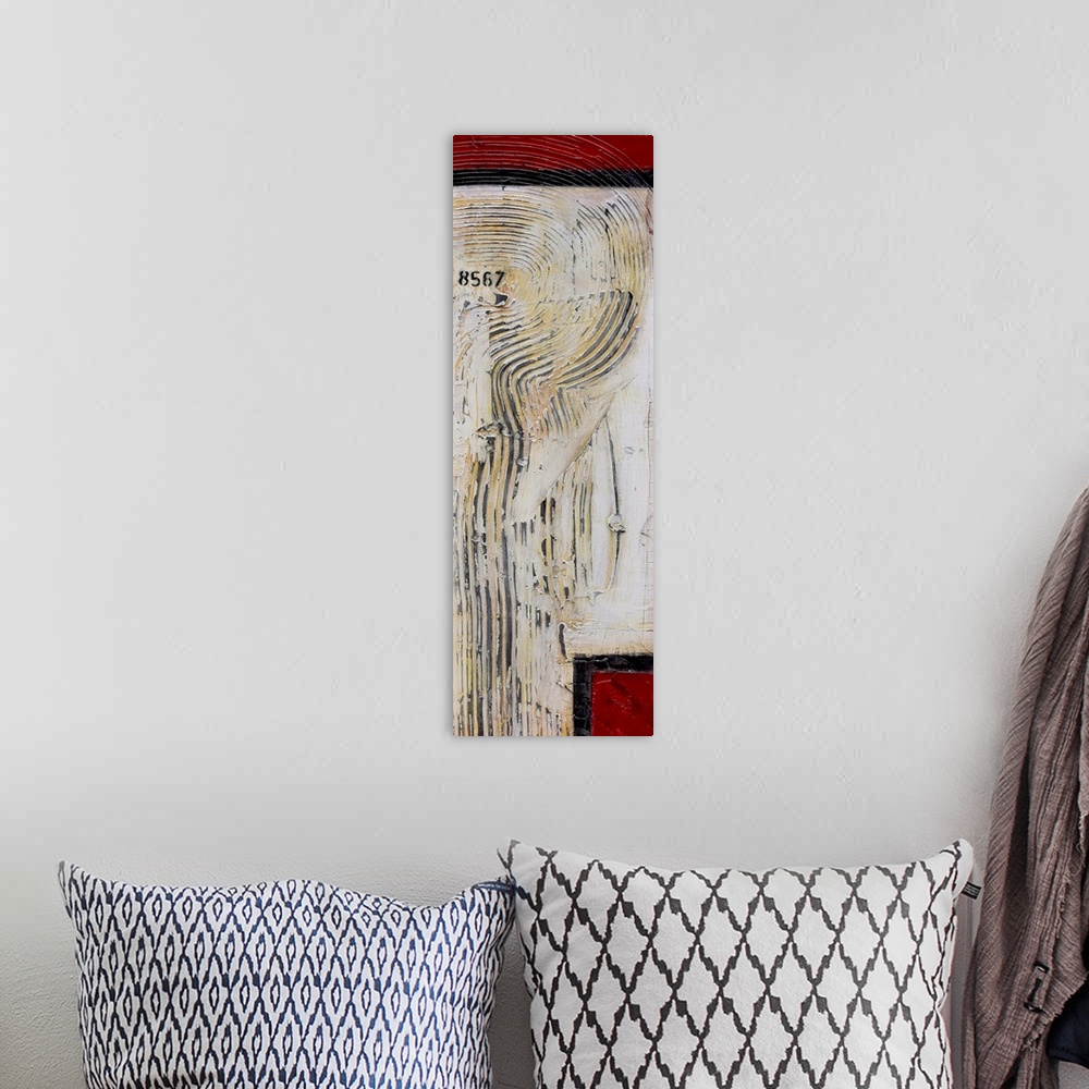 A bohemian room featuring Contemporary abstract artwork in red and white with narrow stripes.