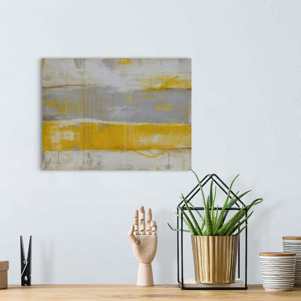 A bohemian room featuring Contemporary abstract painting using gray and yellow.