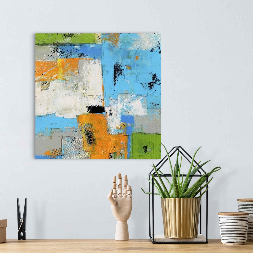 A bohemian room featuring A square contemporary abstract painting with heavy textures and a variety of shapes and lines tha...