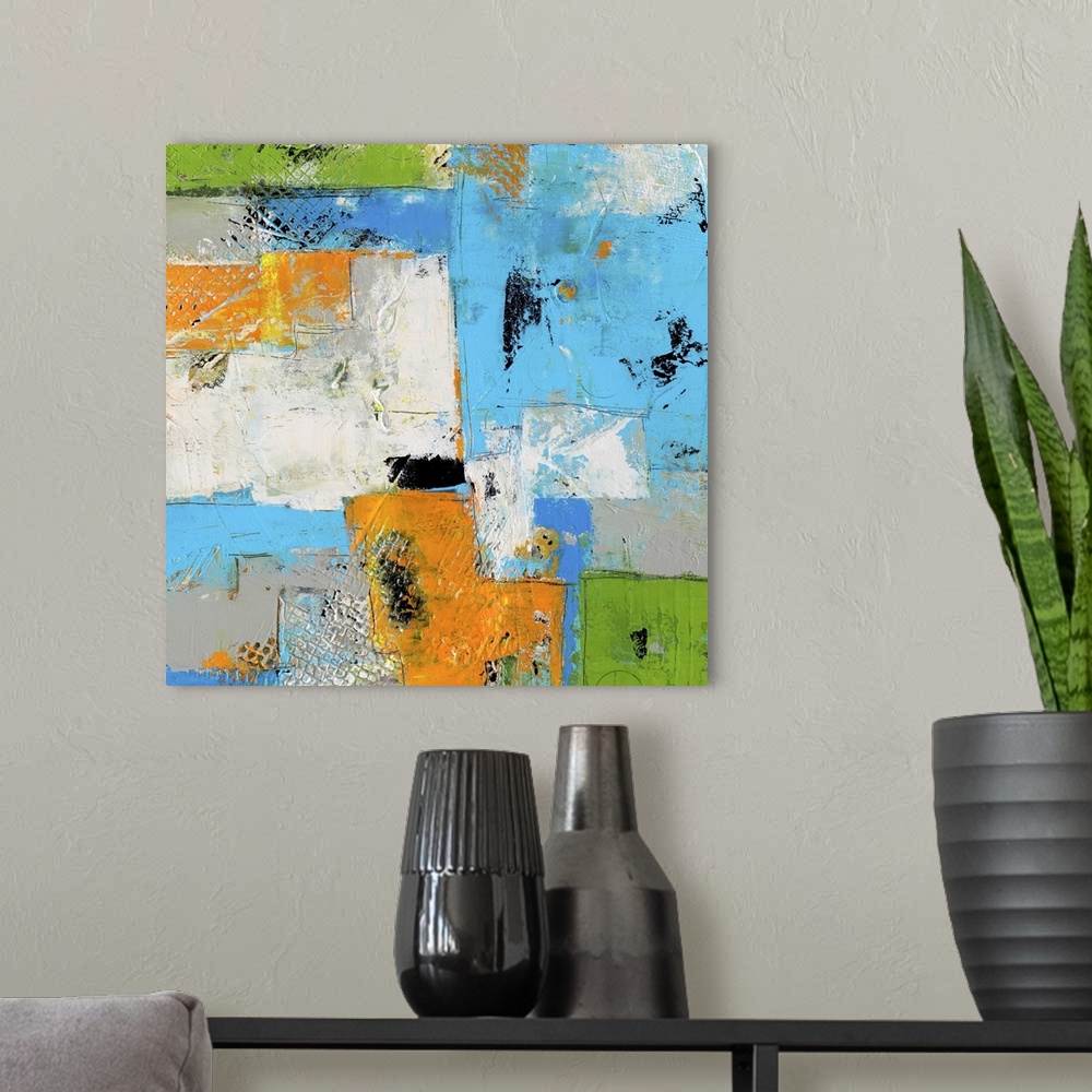 A modern room featuring A square contemporary abstract painting with heavy textures and a variety of shapes and lines tha...