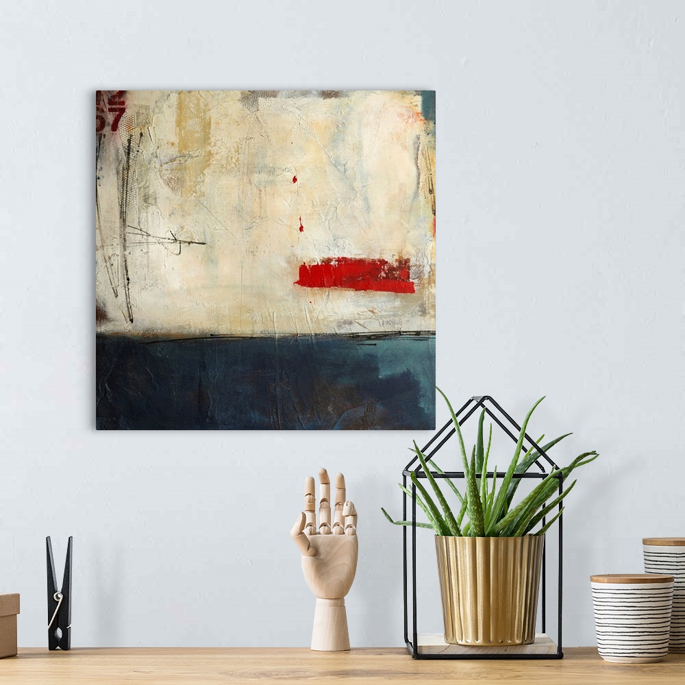 A bohemian room featuring This square shaped decorative wall art is an abstract painting that is slight reminiscent of the ...