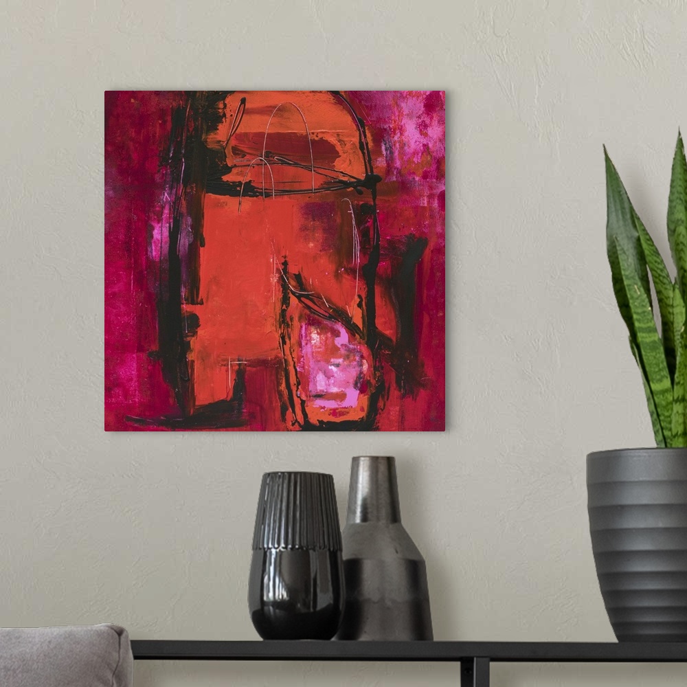 A modern room featuring Contemporary abstract artwork in shades of red and magenta.