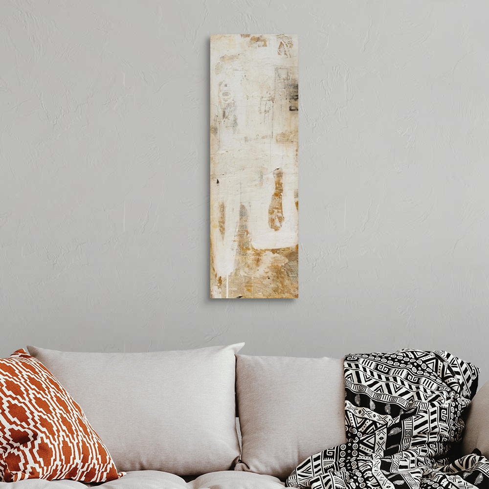 A bohemian room featuring Abstract vertical contemporary art print of organic shapes and lines in muted earth tones.