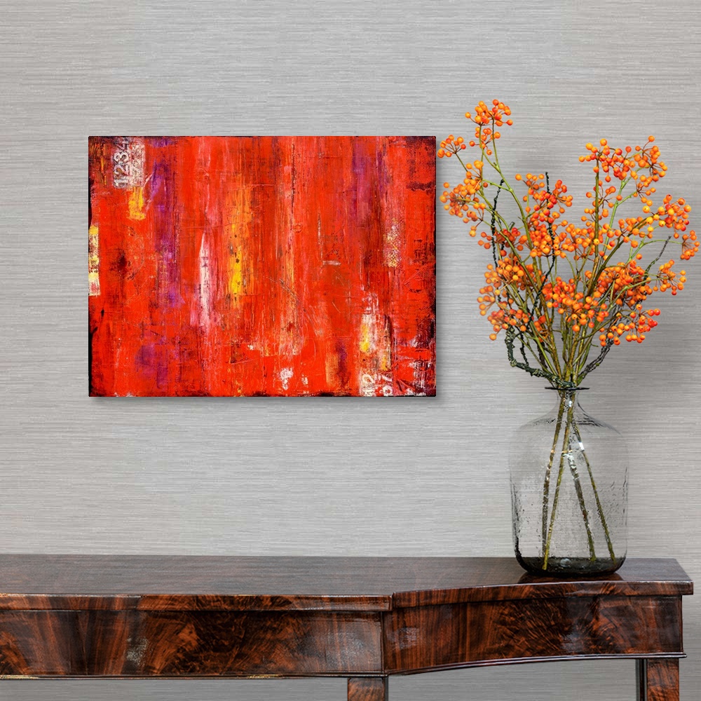 A traditional room featuring Contemporary abstract painting using bright vibrant red with streaks of yellow.