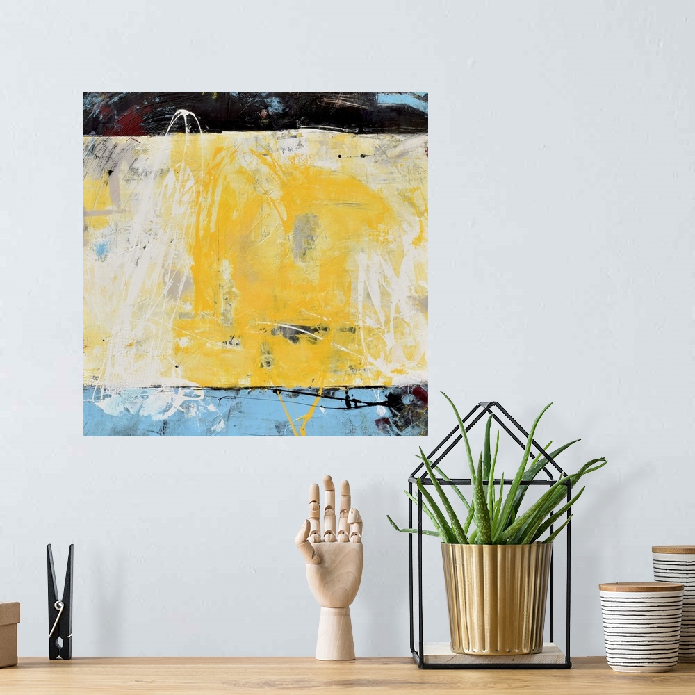 A bohemian room featuring Contemporary abstract color field style painting using blue, black and yellow.