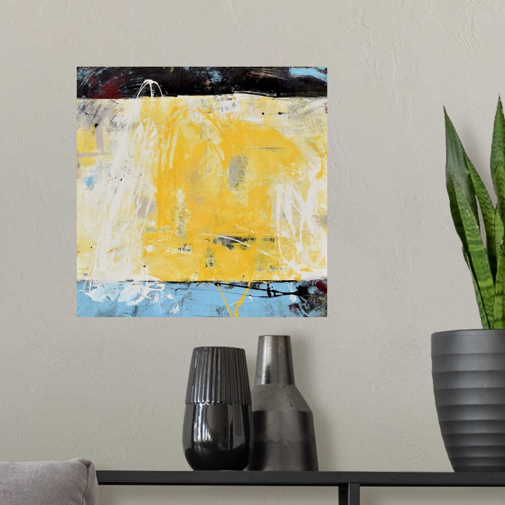 A modern room featuring Contemporary abstract color field style painting using blue, black and yellow.