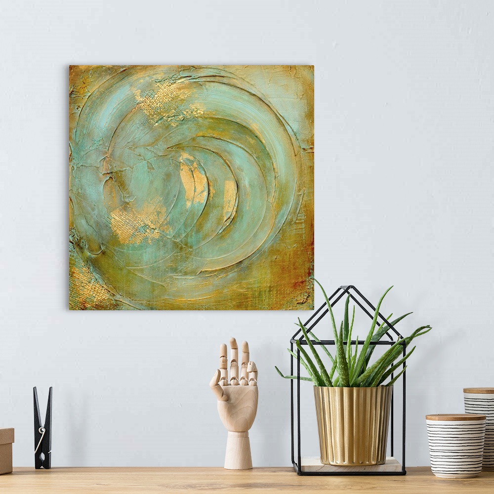 A bohemian room featuring This heavily textured contemporary artwork features an abstract circular design with inspirationa...