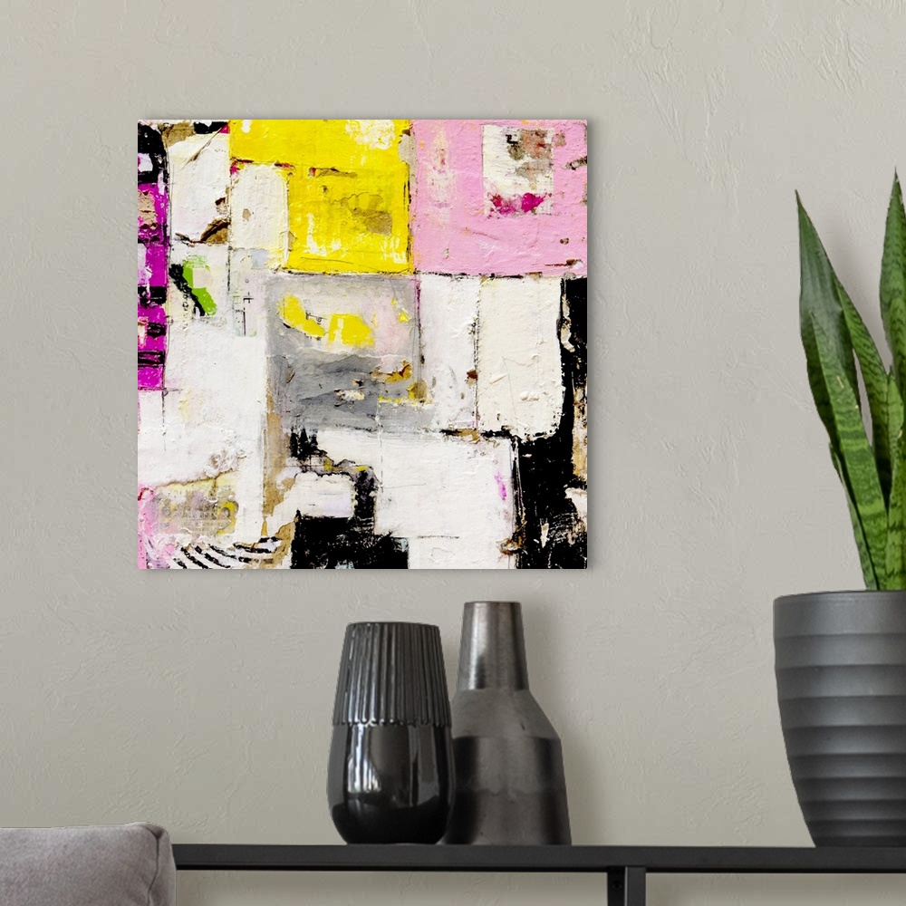 A modern room featuring Contemporary abstract painting in a grungy style in pink, yellow, black, and white.