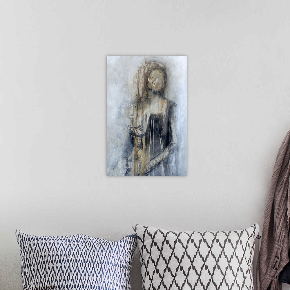 A bohemian room featuring A contemporary abstract of two women created with a collage of paint and newspaper clippings. Thi...