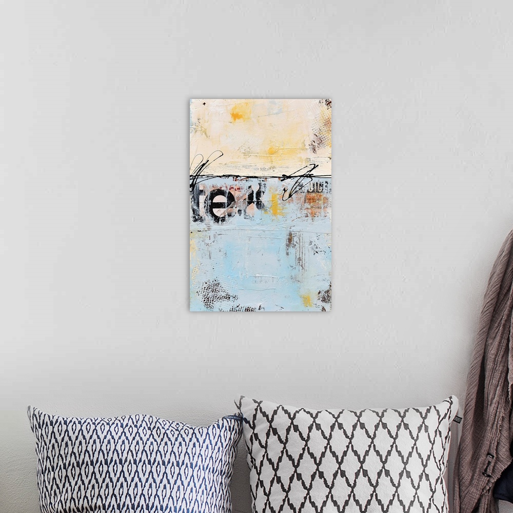 A bohemian room featuring A contemporary abstract painting using a neutral tone face to face with a pale blue and partially...