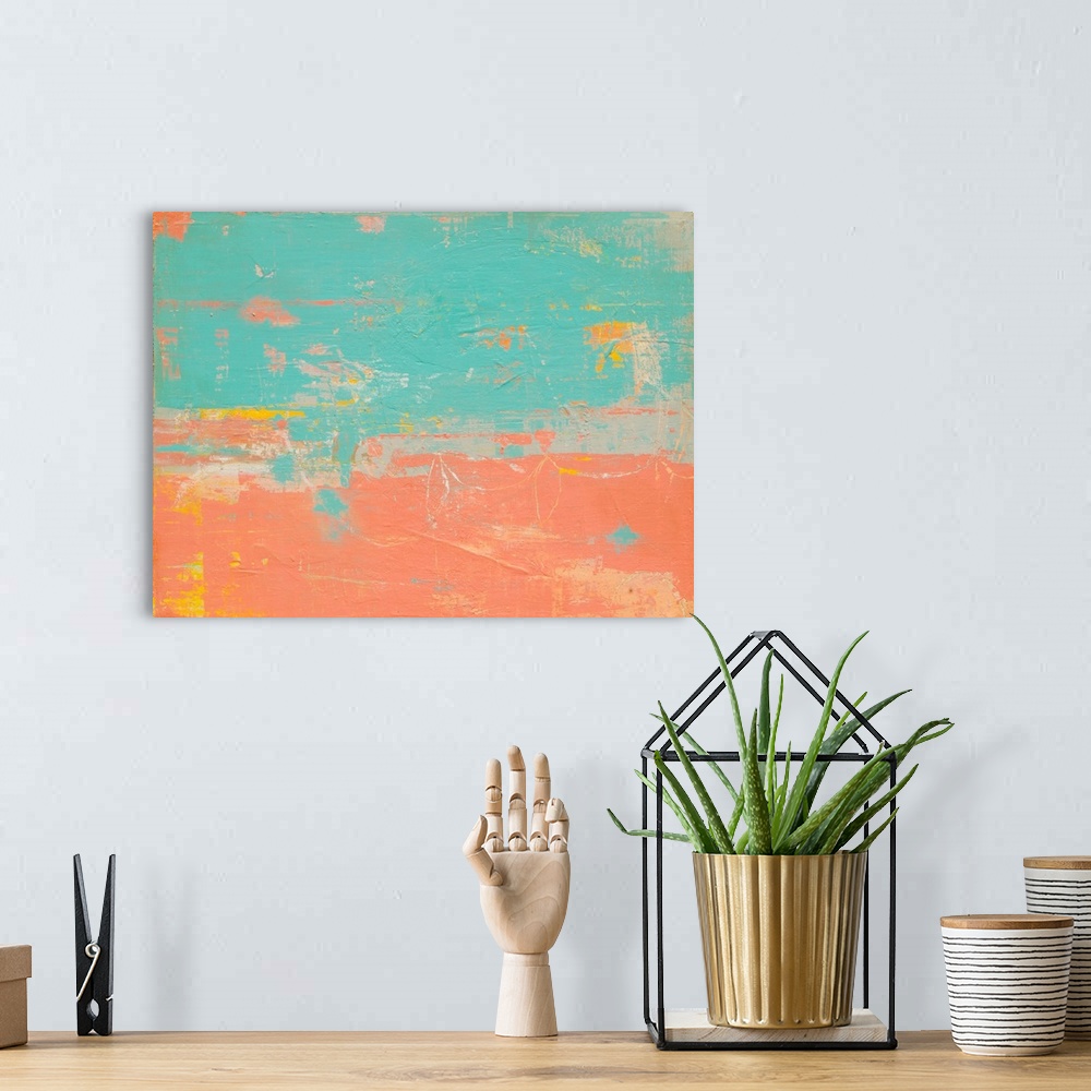 A bohemian room featuring Warm blue and salmon pink colored abstract painting with pops of yellow and orange.