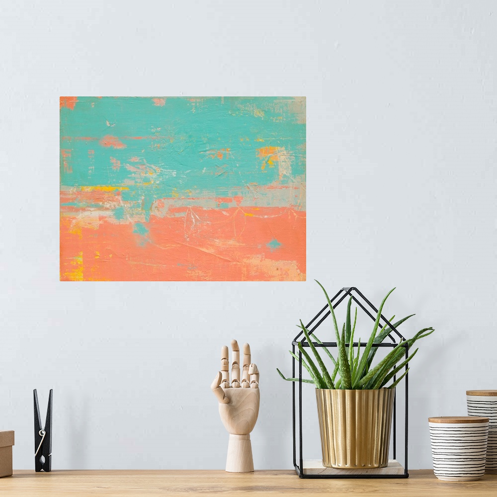 A bohemian room featuring Warm blue and salmon pink colored abstract painting with pops of yellow and orange.