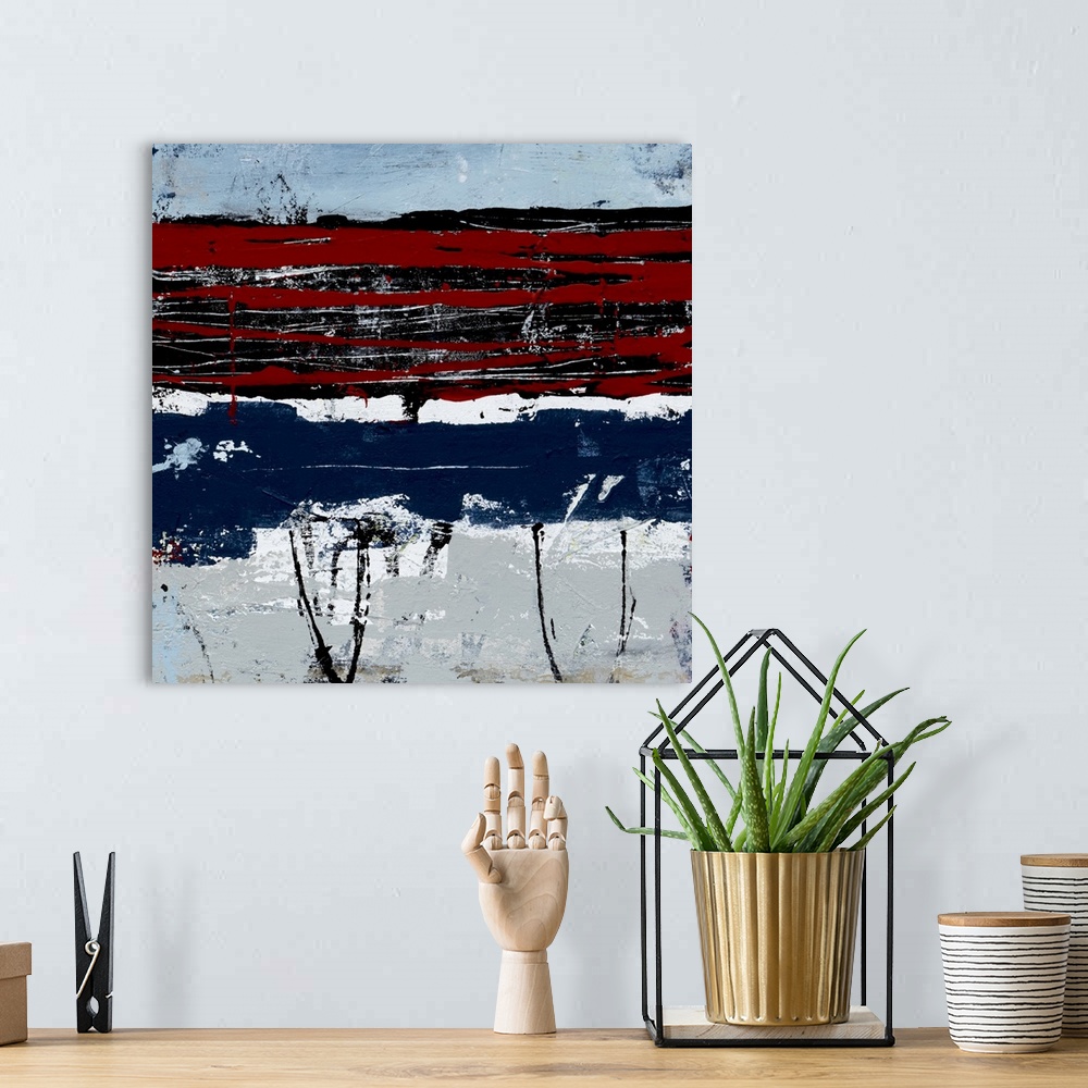A bohemian room featuring Contemporary abstract art in red and navy blue with white stripes.