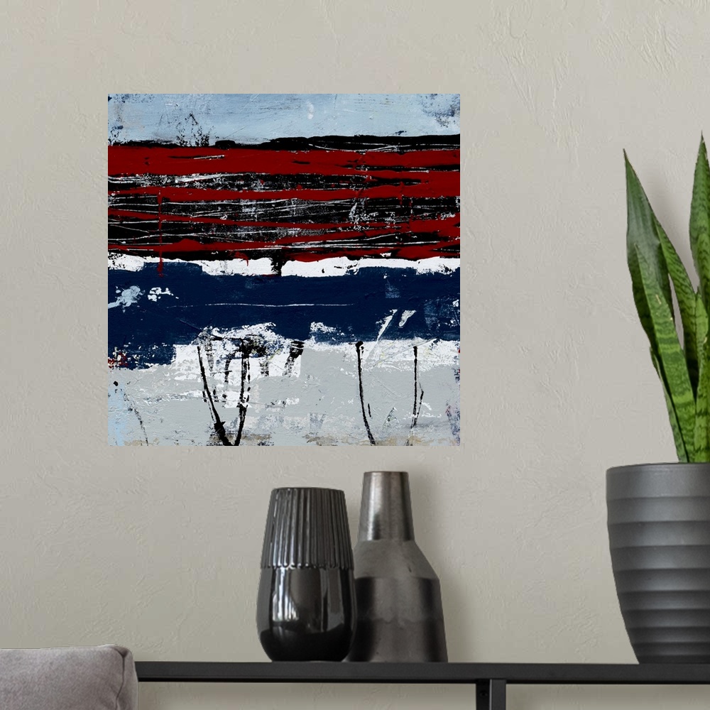 A modern room featuring Contemporary abstract art in red and navy blue with white stripes.