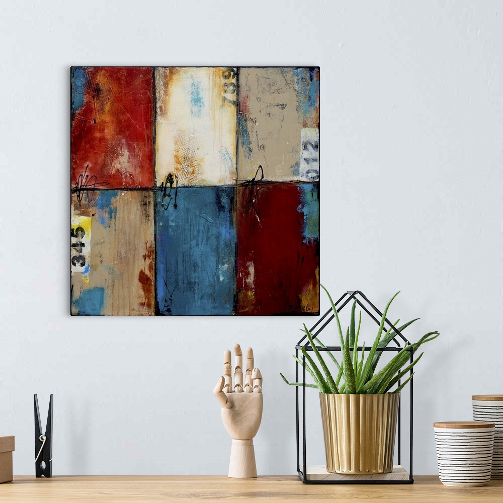 A bohemian room featuring Contemporary abstract artwork of blue, red, and white color blocks.