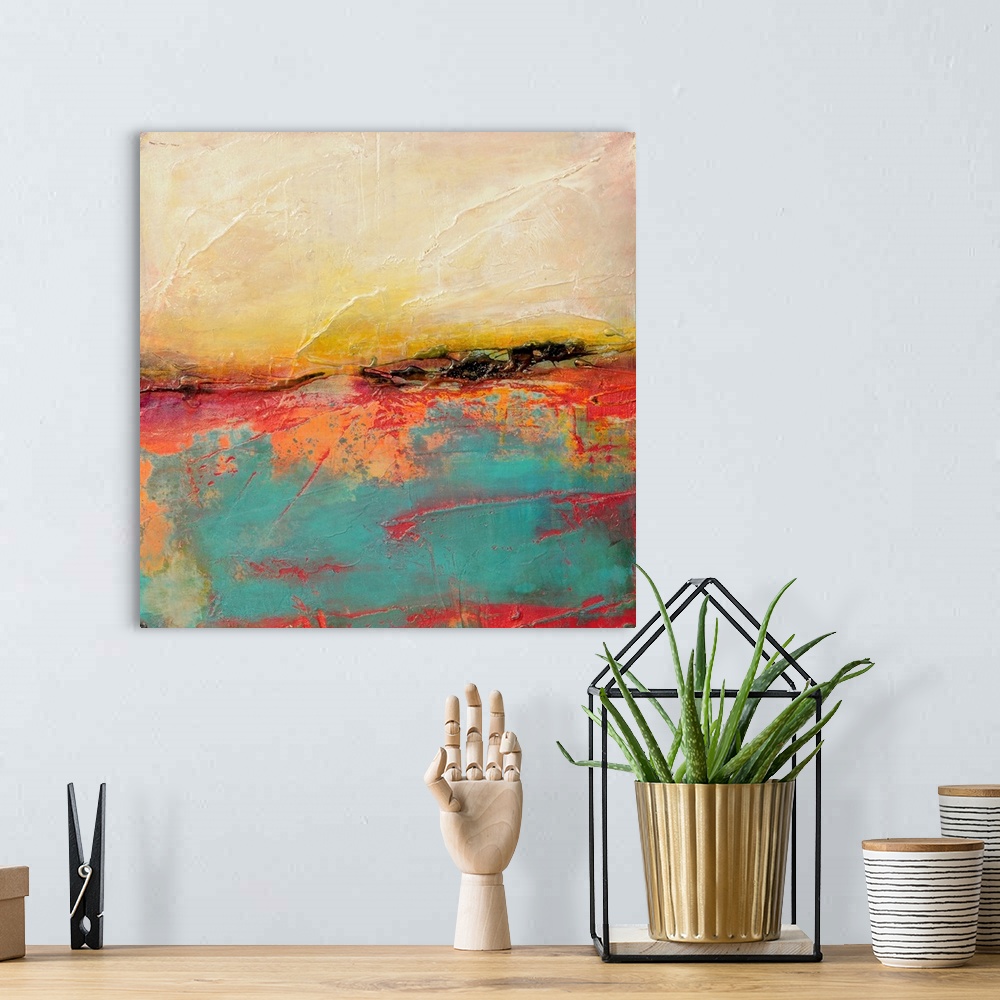 A bohemian room featuring Vibrantly colored square abstract wall art with heavy paint textures.