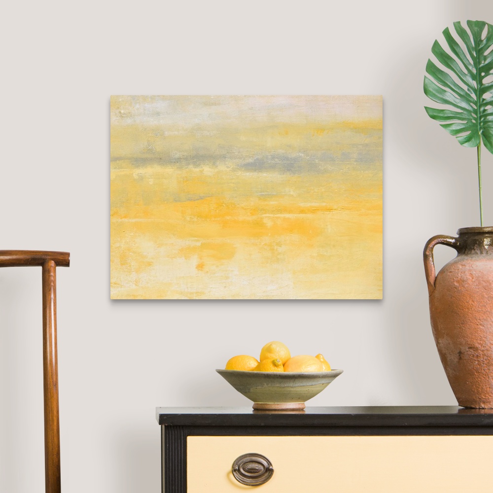 A traditional room featuring Contemporary abstract painting using pale yellow and gray.