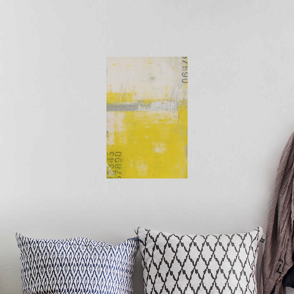 A bohemian room featuring Bright contemporary abstract art in yellow and grey with stenciled numbers.