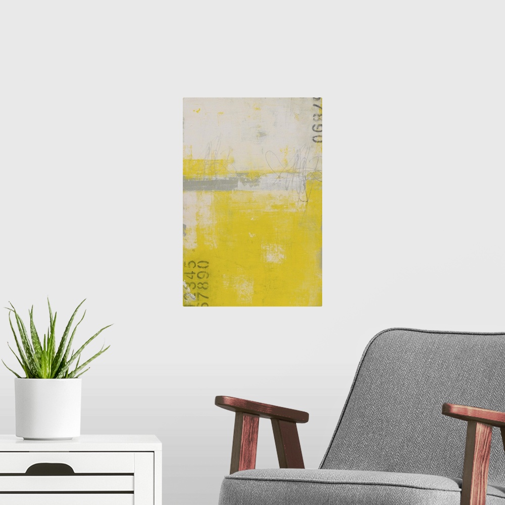 A modern room featuring Bright contemporary abstract art in yellow and grey with stenciled numbers.