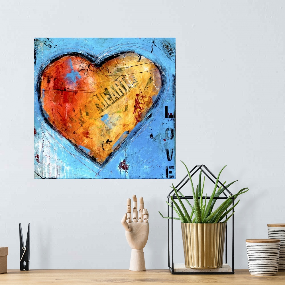 A bohemian room featuring Contemporary artwork of a large orange heart with found lettering on blue.