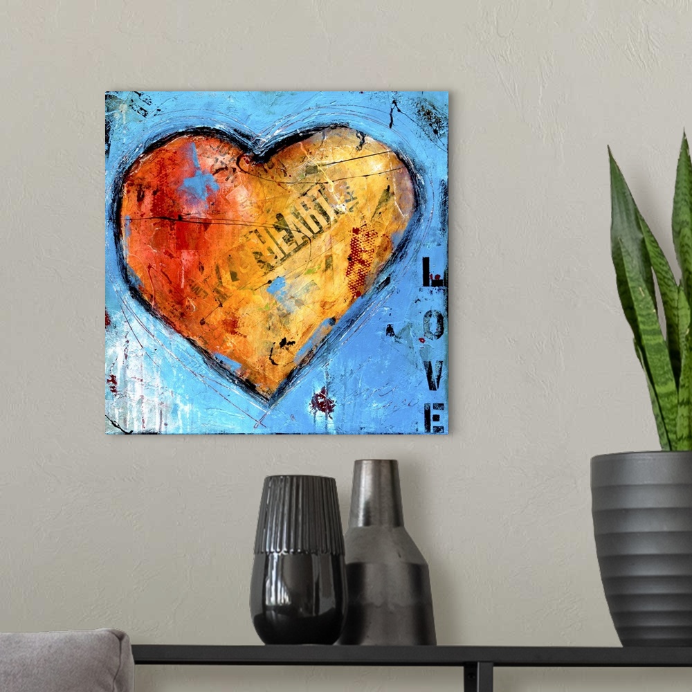 A modern room featuring Contemporary artwork of a large orange heart with found lettering on blue.