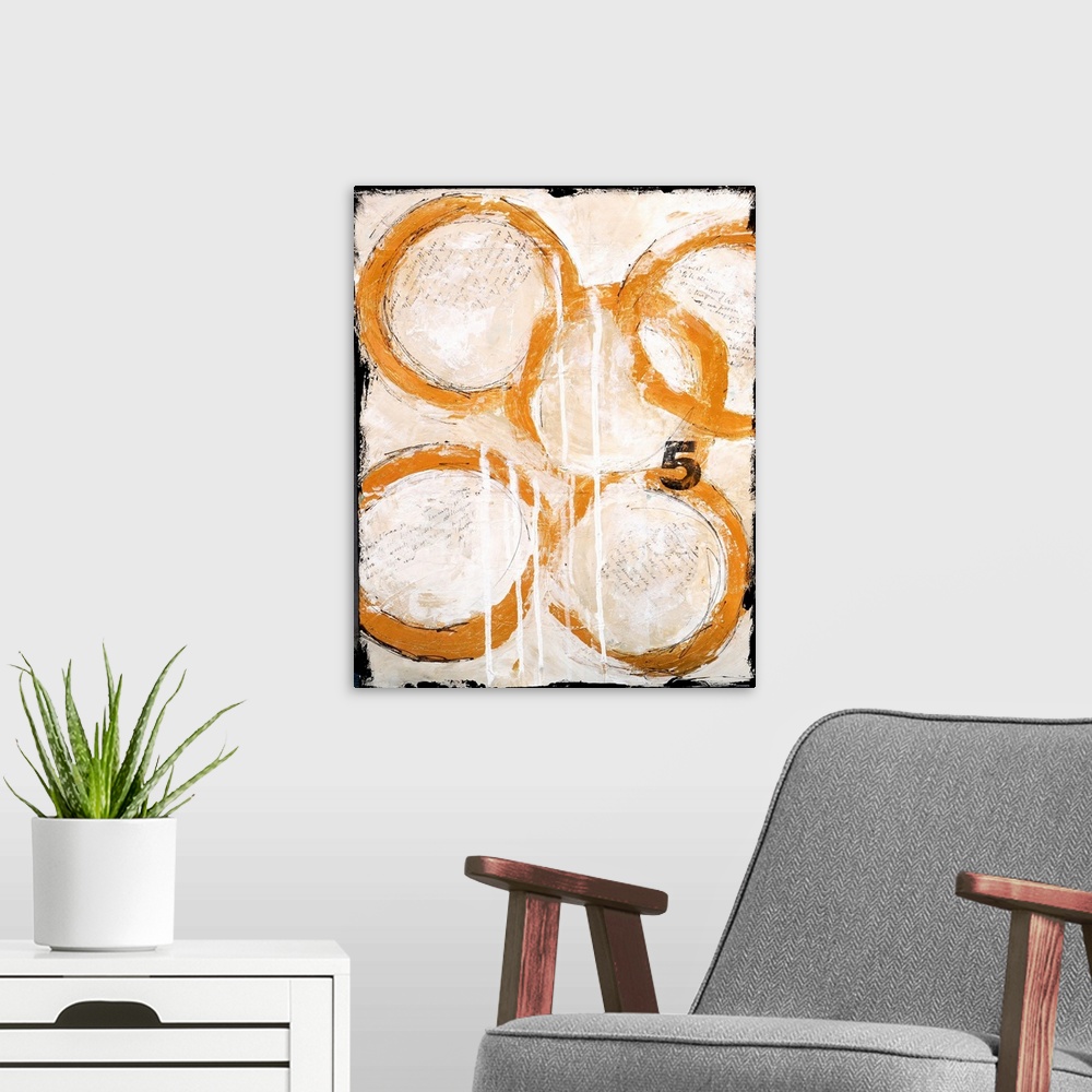 A modern room featuring A contemporary abstract painting of five intertwined gold circles and the number five on a cream ...