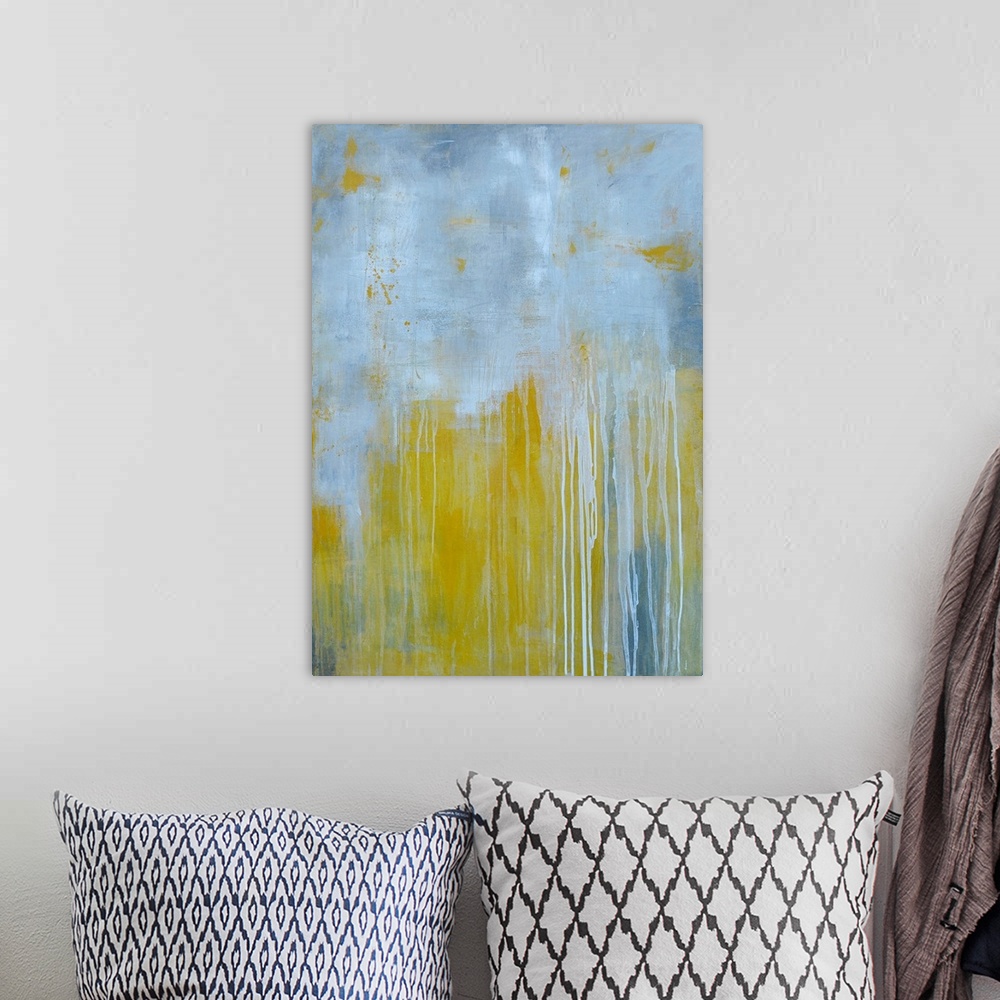 A bohemian room featuring Large abstract art comprised of two fairly equal patches of muted tones running into each other. ...