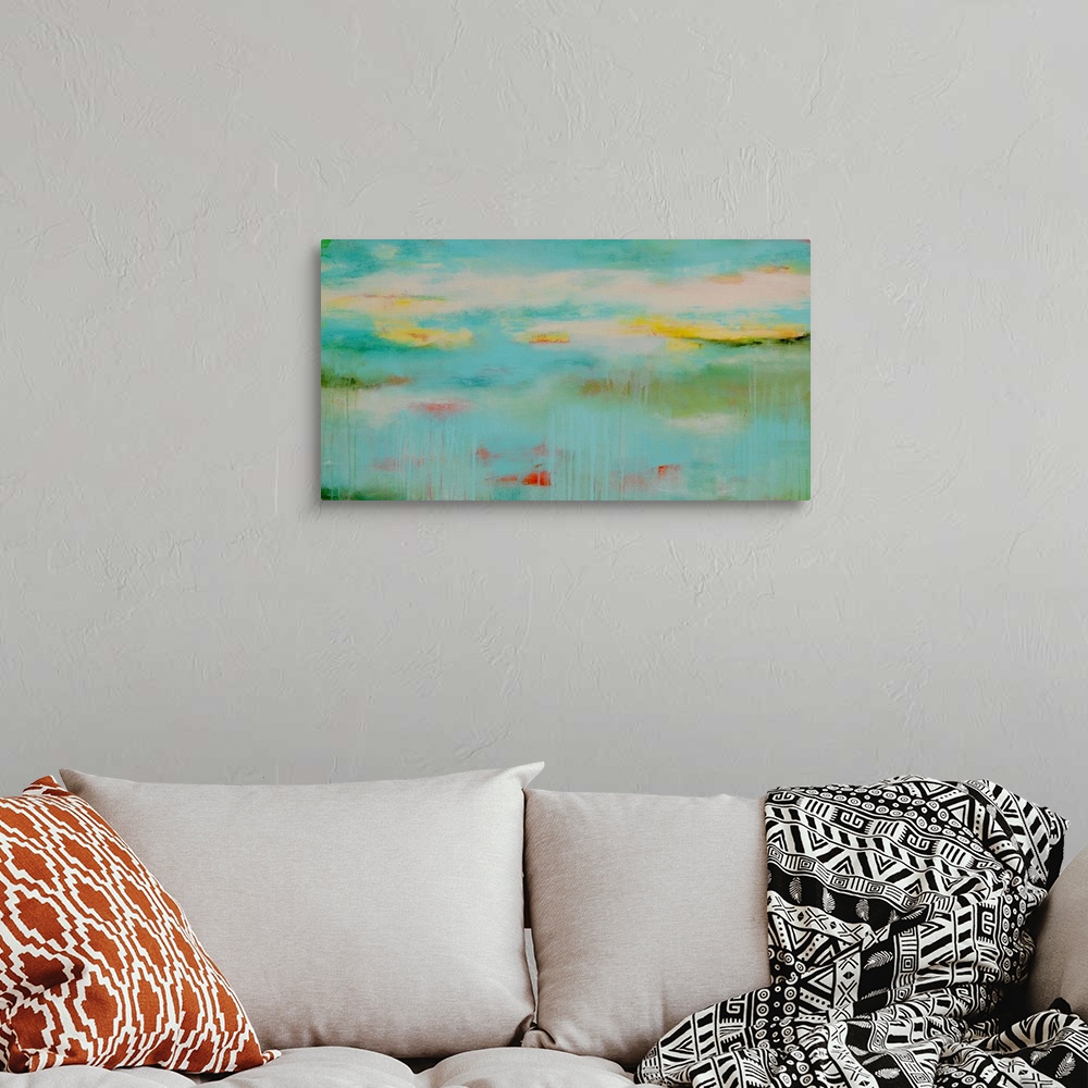A bohemian room featuring Abstract contemporary painting in light, pastel colors, resembling a calm pond in the early morning.