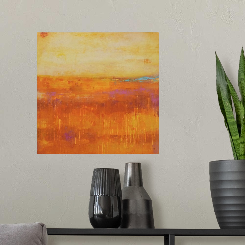 A modern room featuring A contemporary abstract painting using a pale orange and a dark orange meeting face to face.