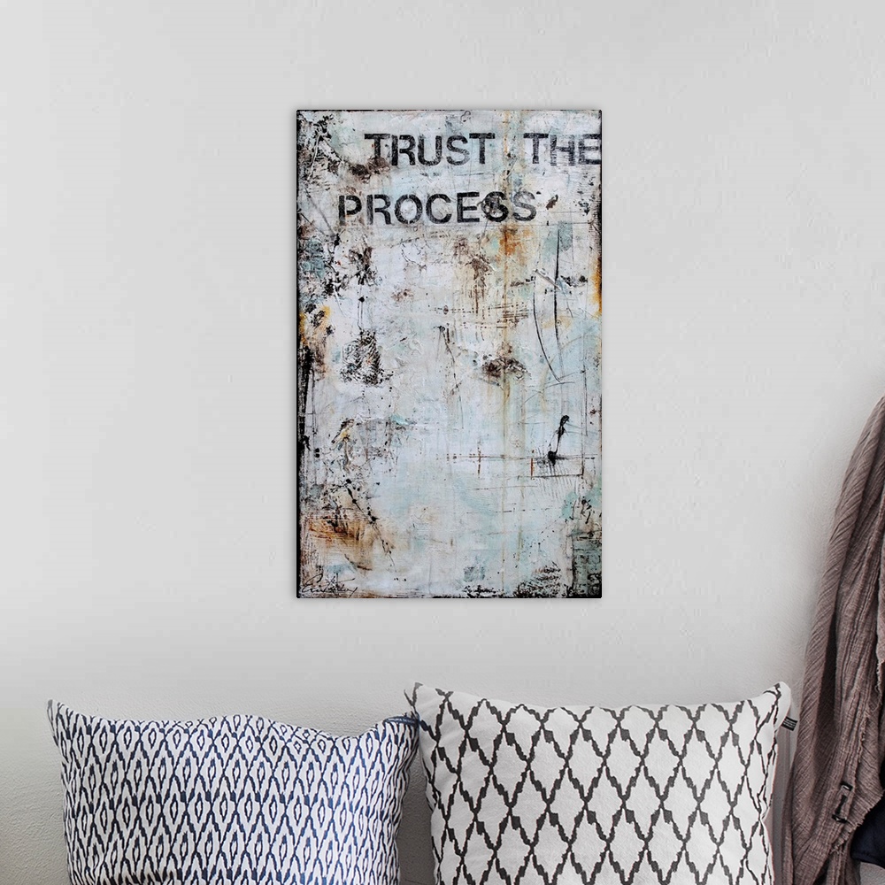 A bohemian room featuring Trust The Process