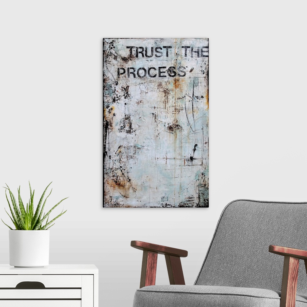 A modern room featuring Trust The Process