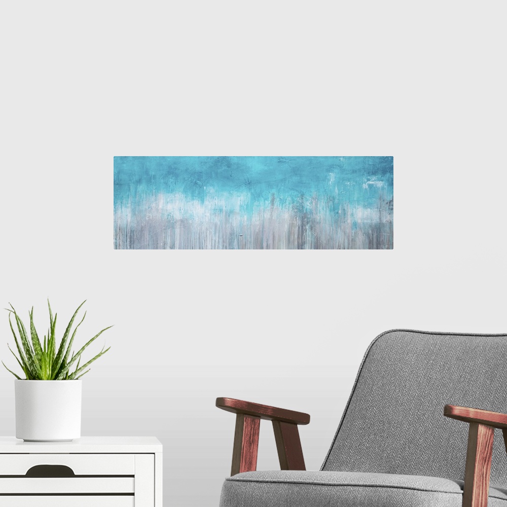 A modern room featuring Horizontal abstract painting created with turquoise turning into grey with streaking lines runnin...
