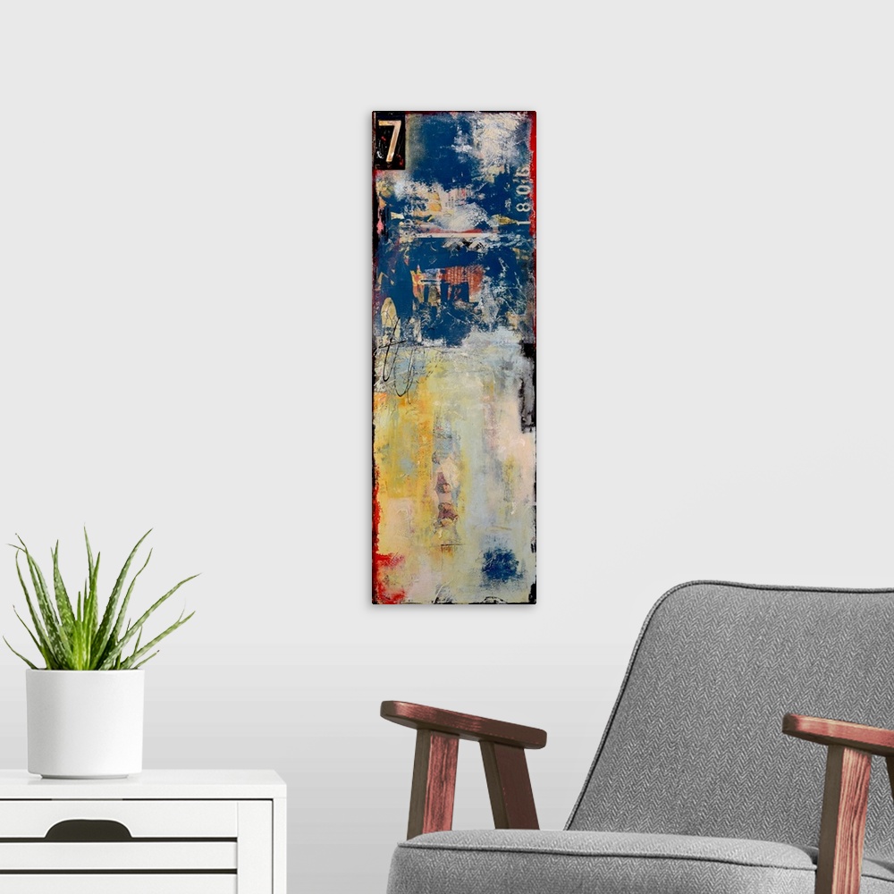 A modern room featuring Tall panel abstract artwork in shades of blue, gray, yellow, black, and red created with mixed me...