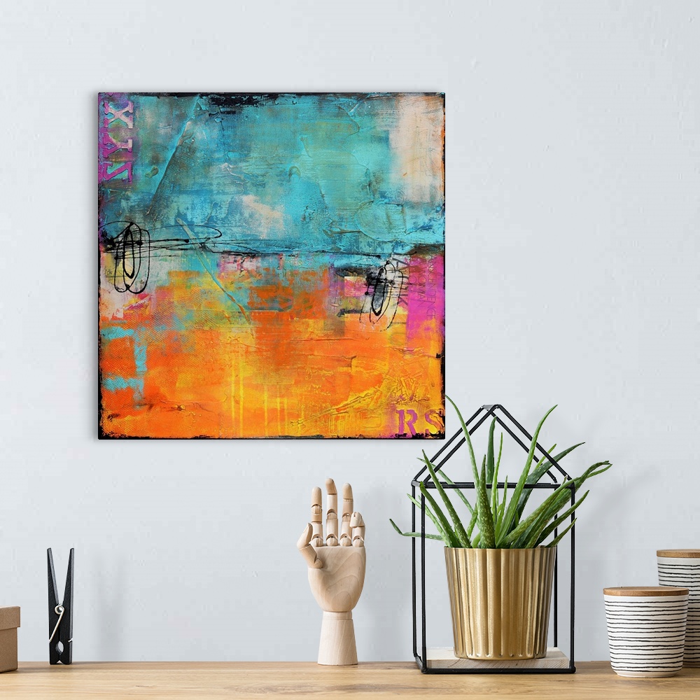 A bohemian room featuring Giant abstract art almost evenly broken into two horizontal rectangles composed of two cool tones...