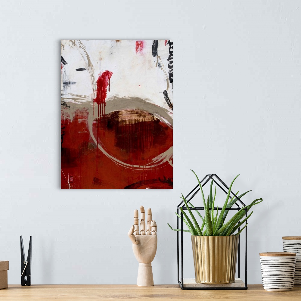 A bohemian room featuring A heavily red, contemporary abstract painting which focuses on dark tones of black, tan, and grey...