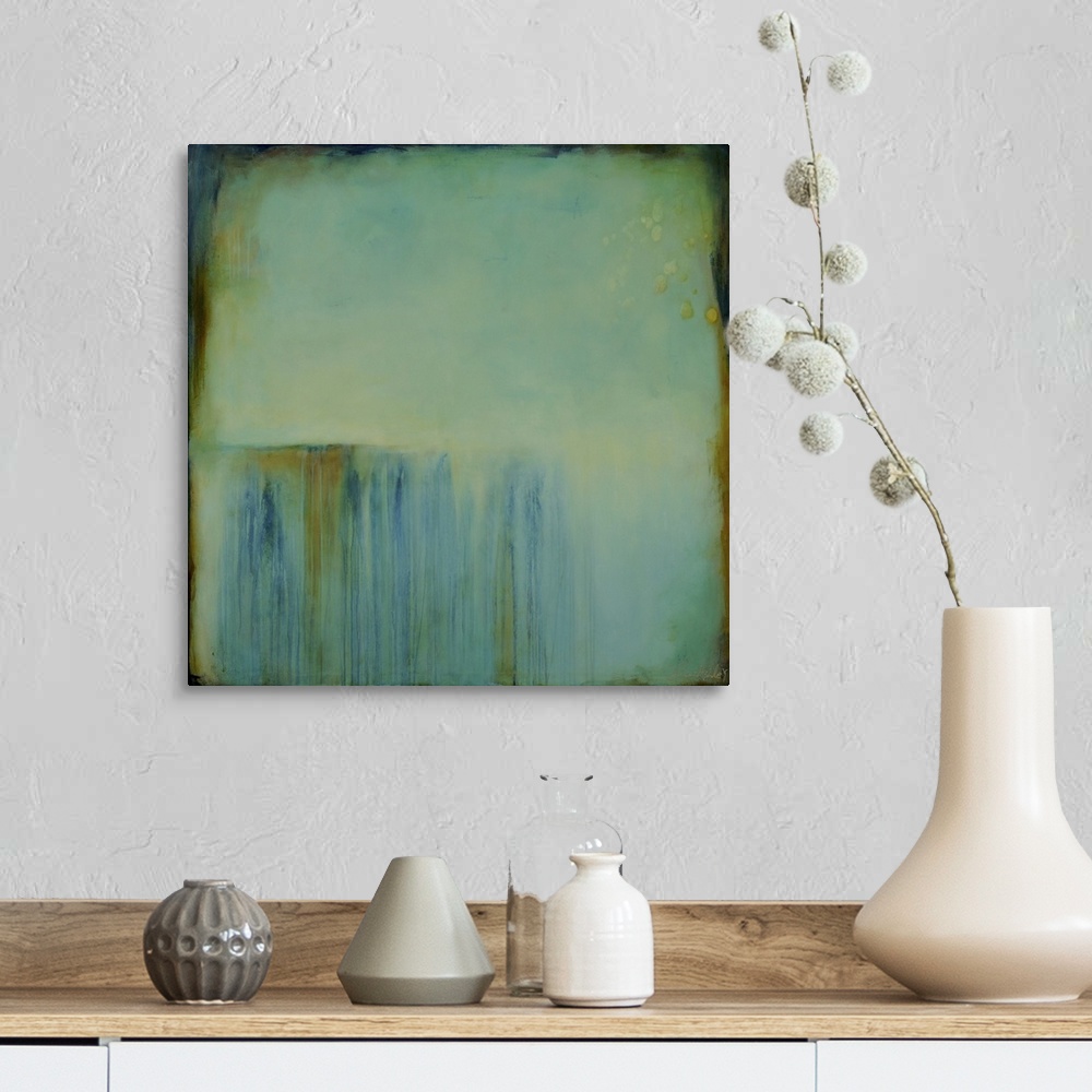 A farmhouse room featuring Square abstract painting created with a muted blue turning into green with streaking lines in bro...