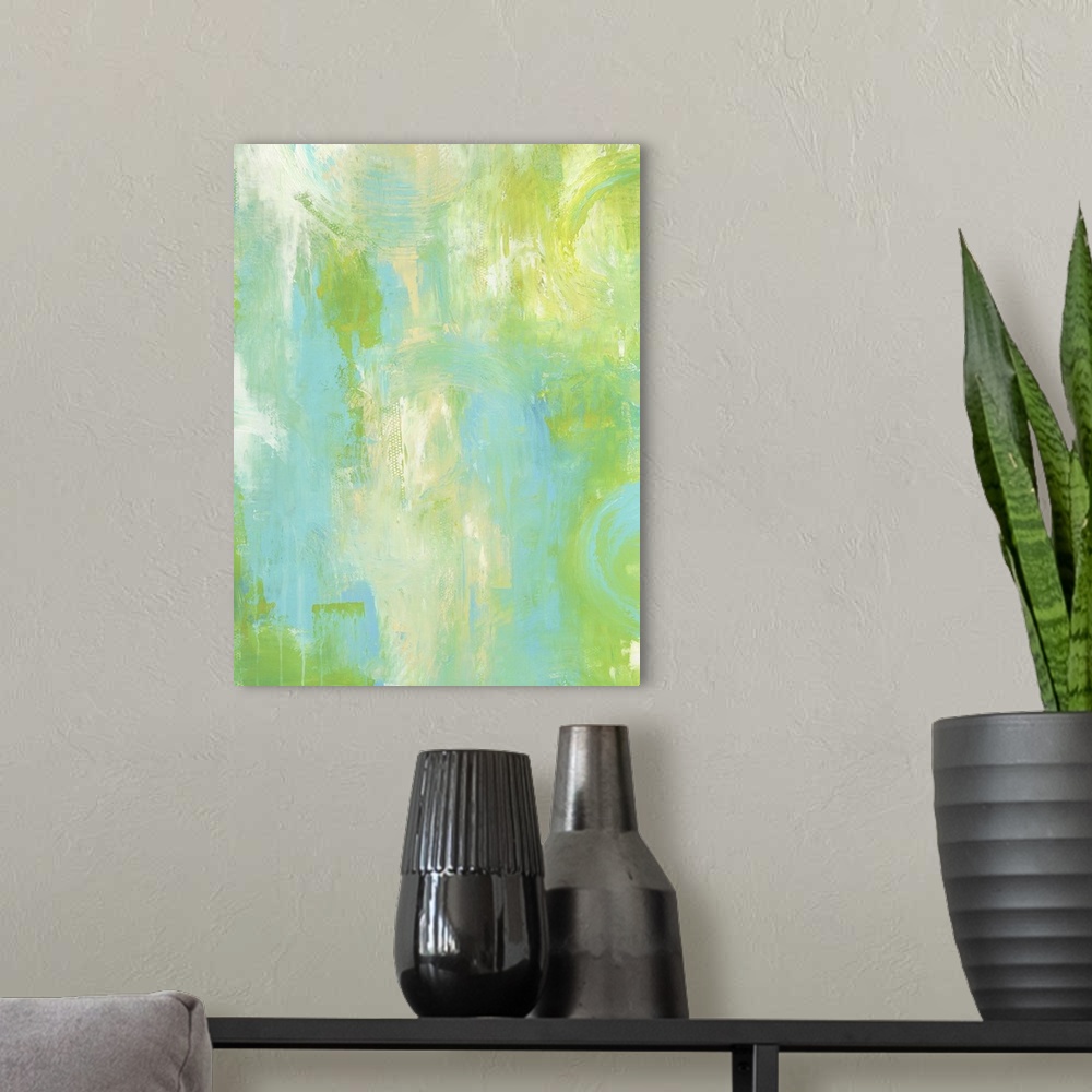 A modern room featuring A contemporary abstract painting using tones of light green and blue.
